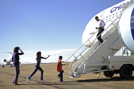 US Democratic presidential candidate Illinois Senator Barack Obama is welcomed by his wife Michelle and daughters Malia, 11 and Sasha, 7, upon landing in Pueblo, Colorado, on November 01, 2008. (EMMANUEL DUNAND/AFP/Getty Images)